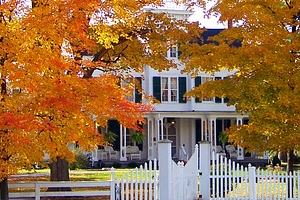 Home exterior in fall - fall cleaning checklist in action.