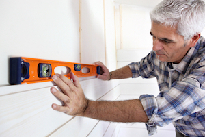 A man completing a home inspection.